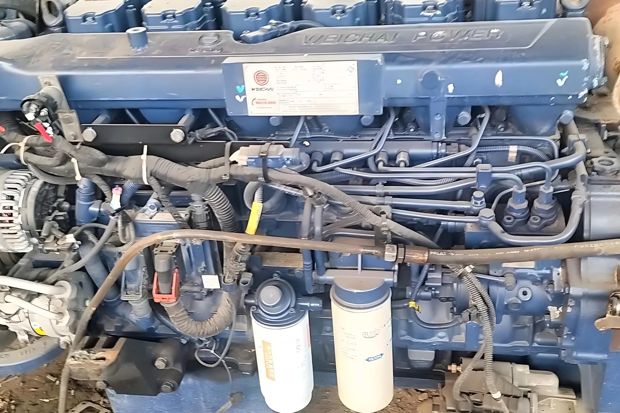 The engine of a cargo truck makes a strange noise.